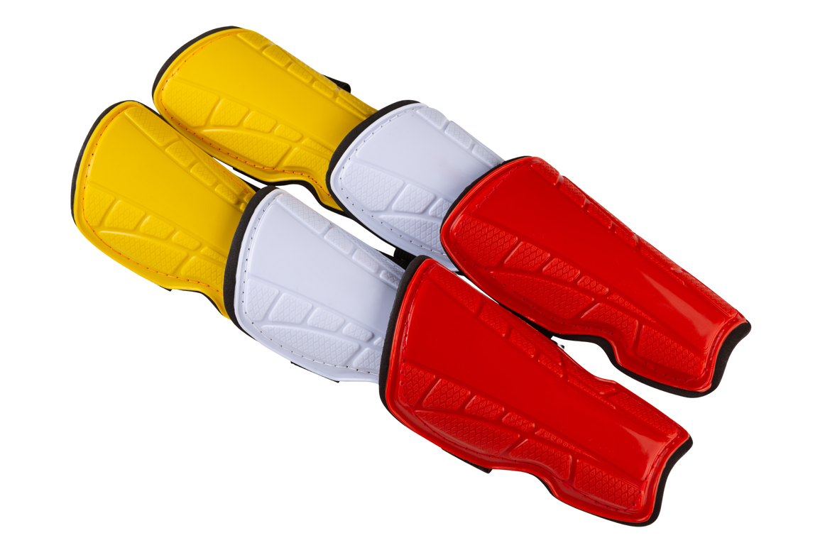 a pair of red, yellow and white soccer shin guards