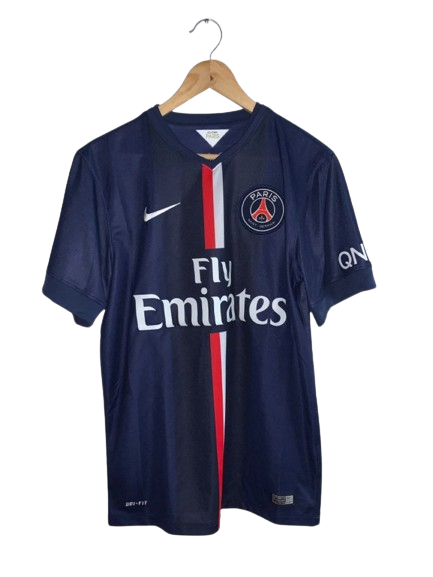 the nike paris saint germain home shirt is shown on a hanger